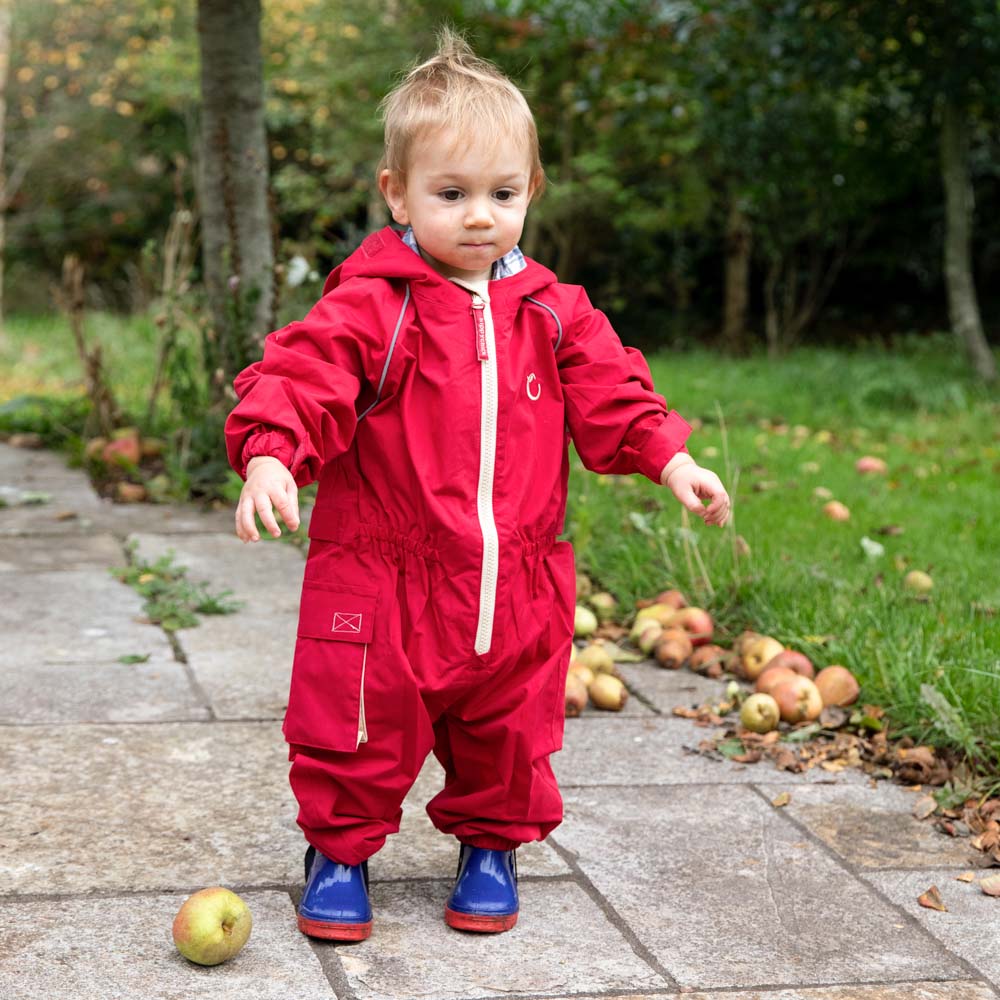 HC -754 RESIZED Little boy in a Fiesta Red Waterproof Suit