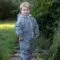 Little boy wearing a Cool Grey Fleece Lined Suit