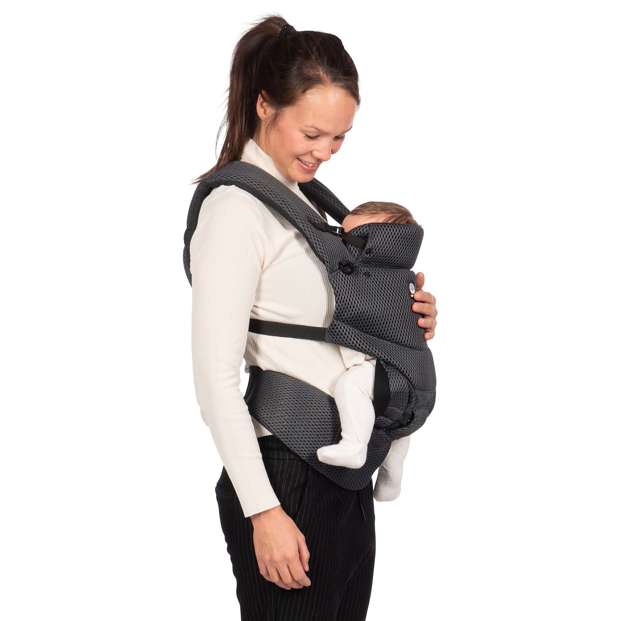 Mum holding baby in the Dooky Urban Comfort Carrier