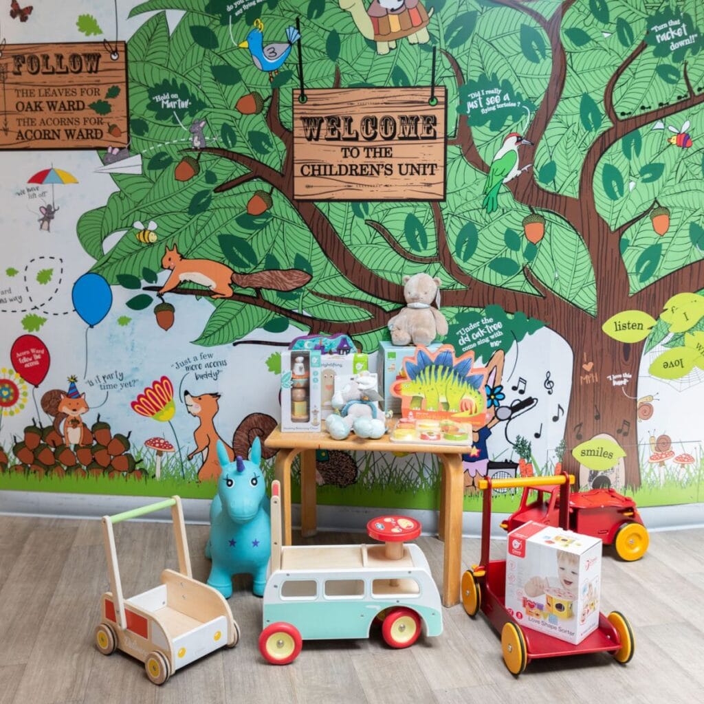 Toys that were gifted by Hippychick in front of the children's ward tree artwork