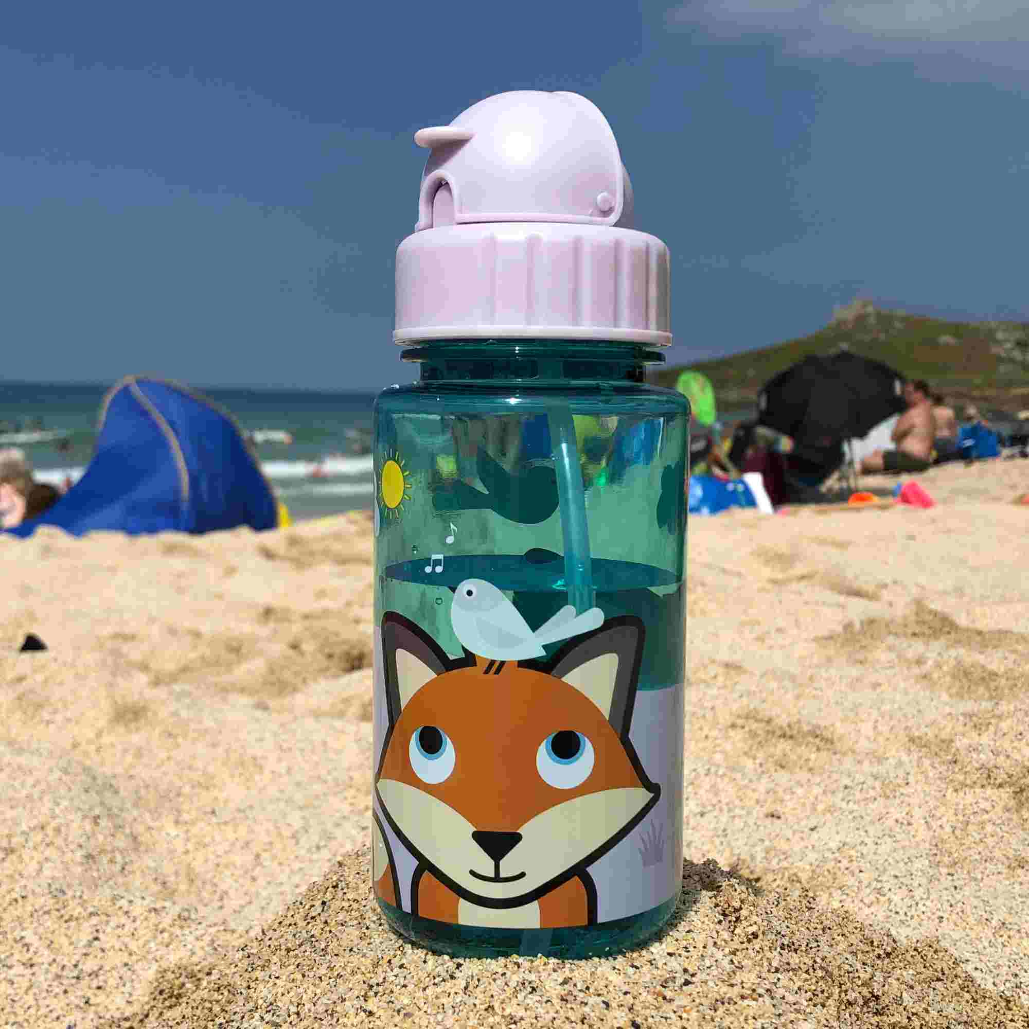 Felicity Fox bottle in the sand
