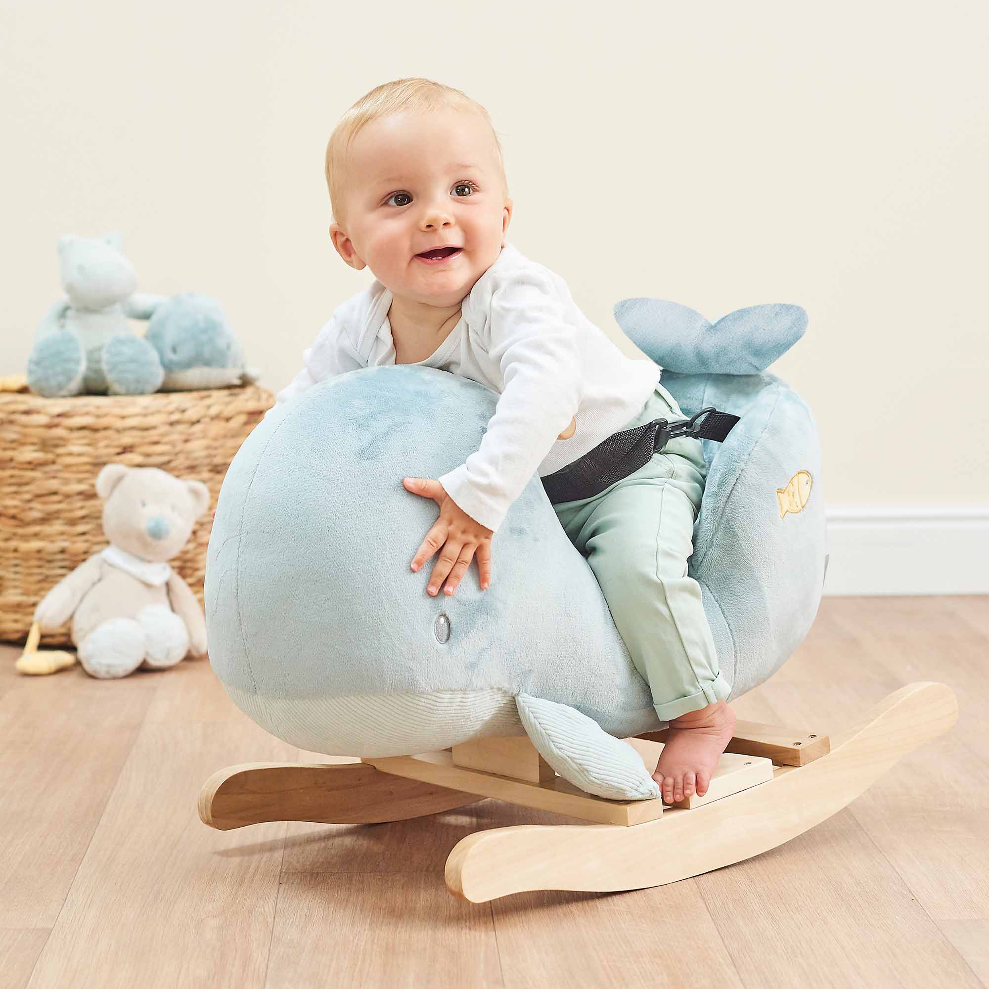 Child on the Sally the Whale Rocker