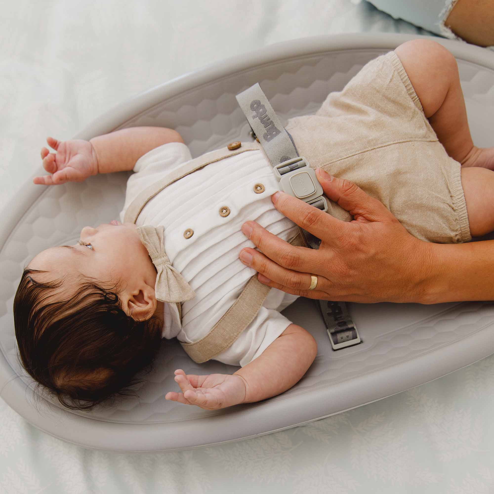 Baby on Bumbo Max Changing Pad