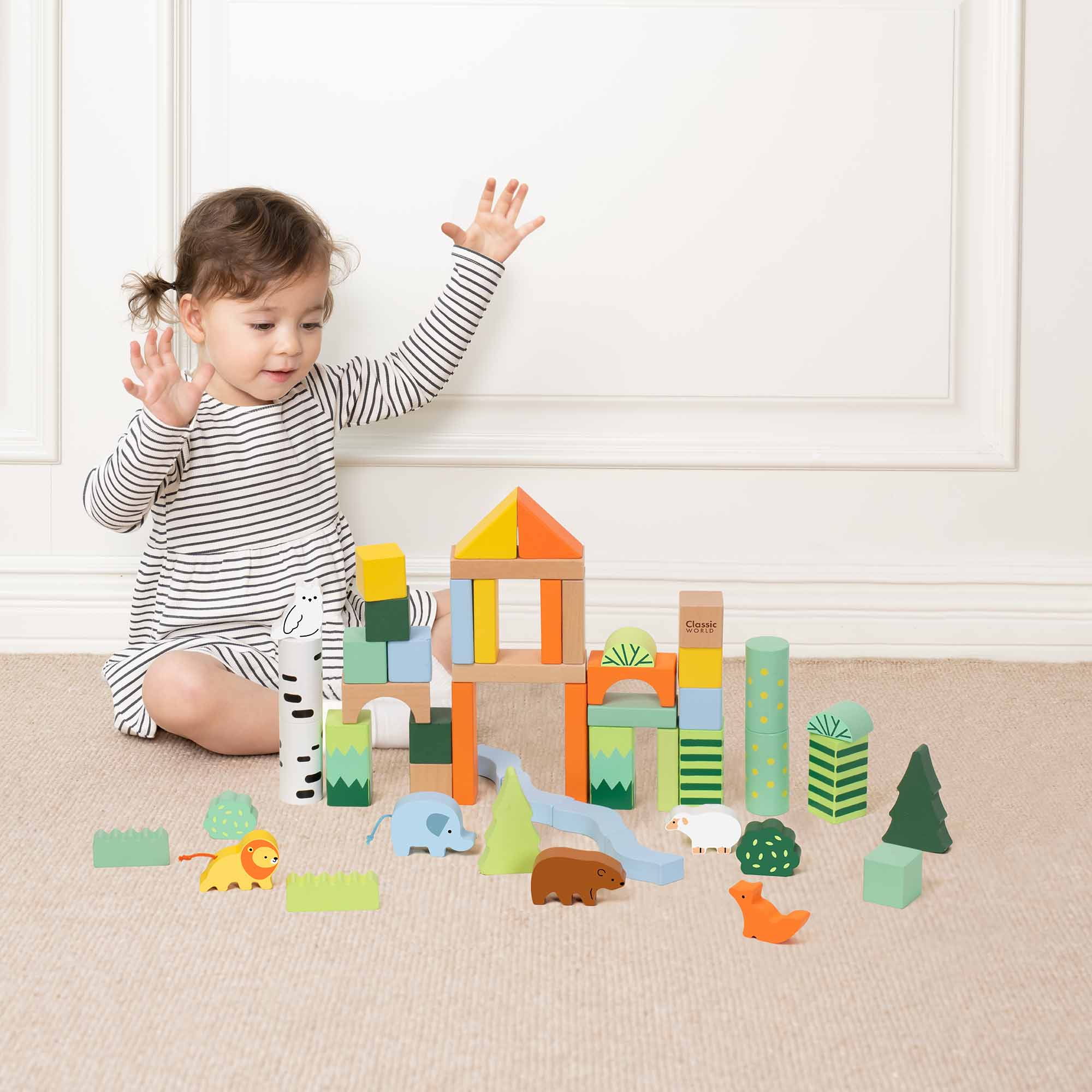 Girl playing with the Classic World Forest Blocks