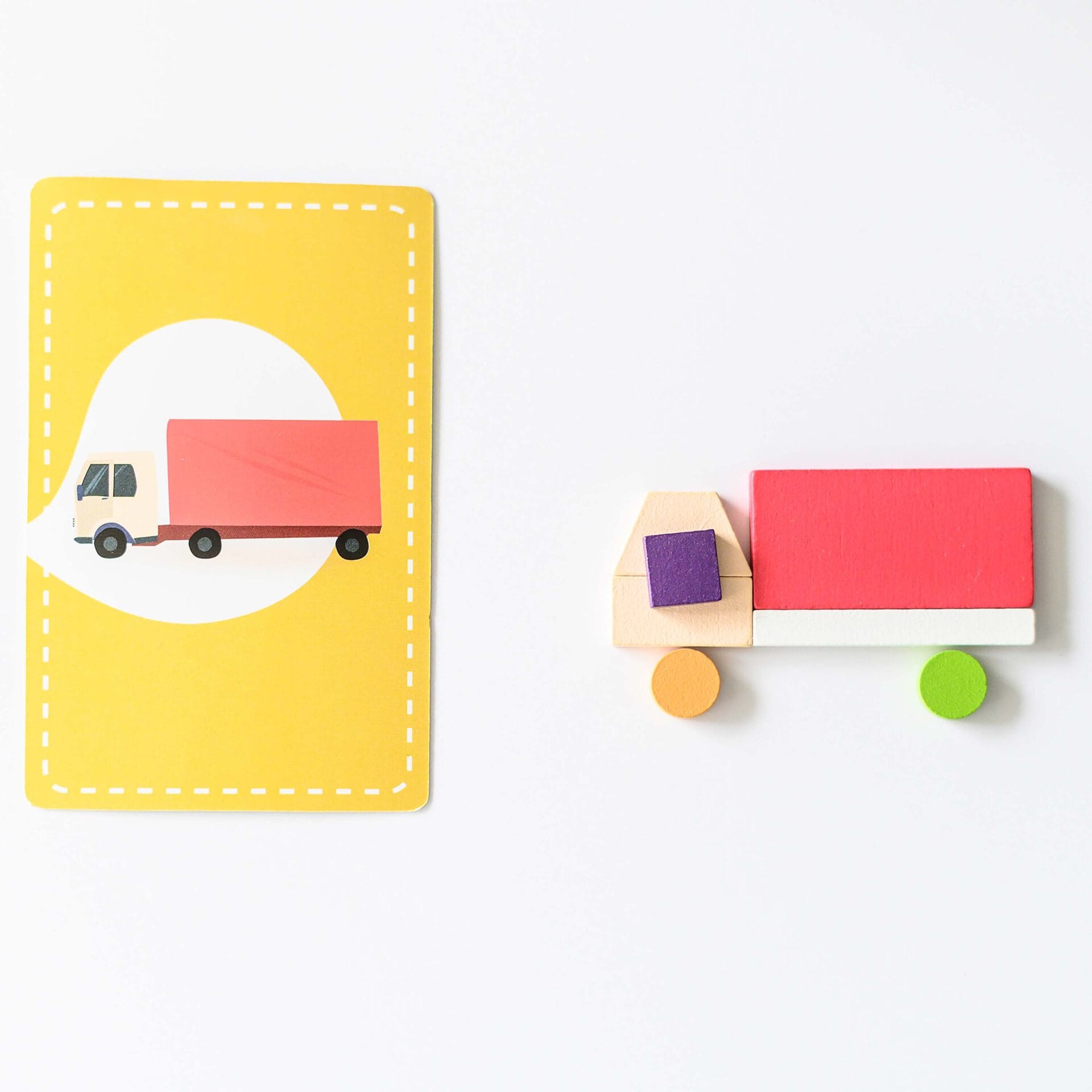 Vilac Whatizis Game pieces in the shape of a truck