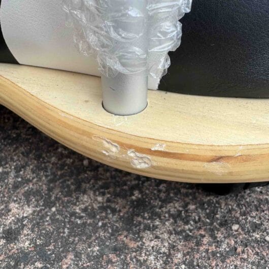 Slight damage on the side of the Wheely Bug wooden base