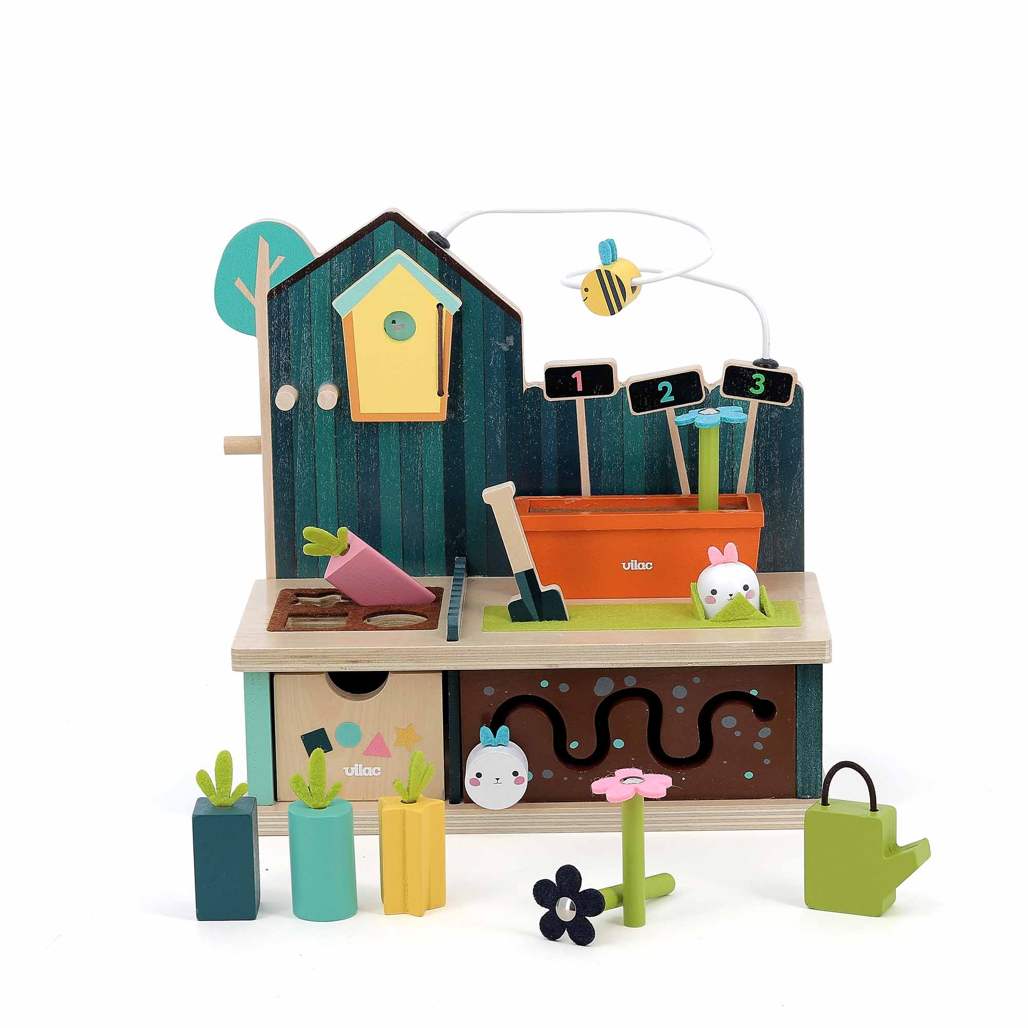 Vilac Early Learning Garden with flower, watering can and veggies in front